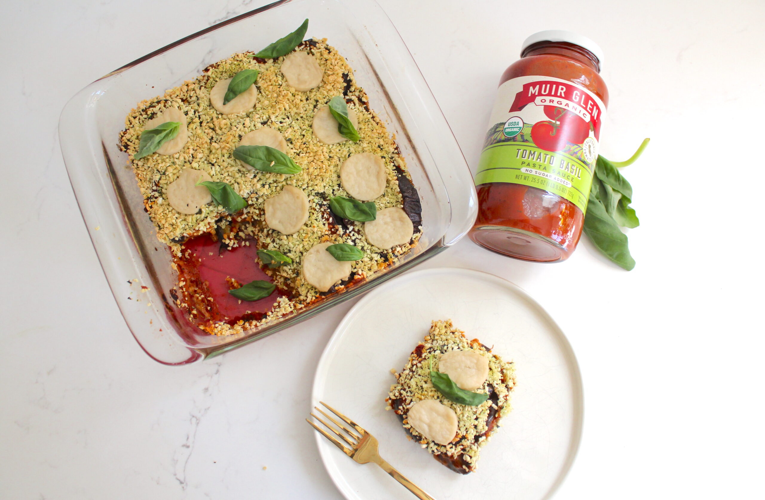 https://www.oliveyouwhole.com/wp-content/uploads/2022/04/Vegan-Eggplant-Parmesan-Bake-Recipe-3-scaled.jpg